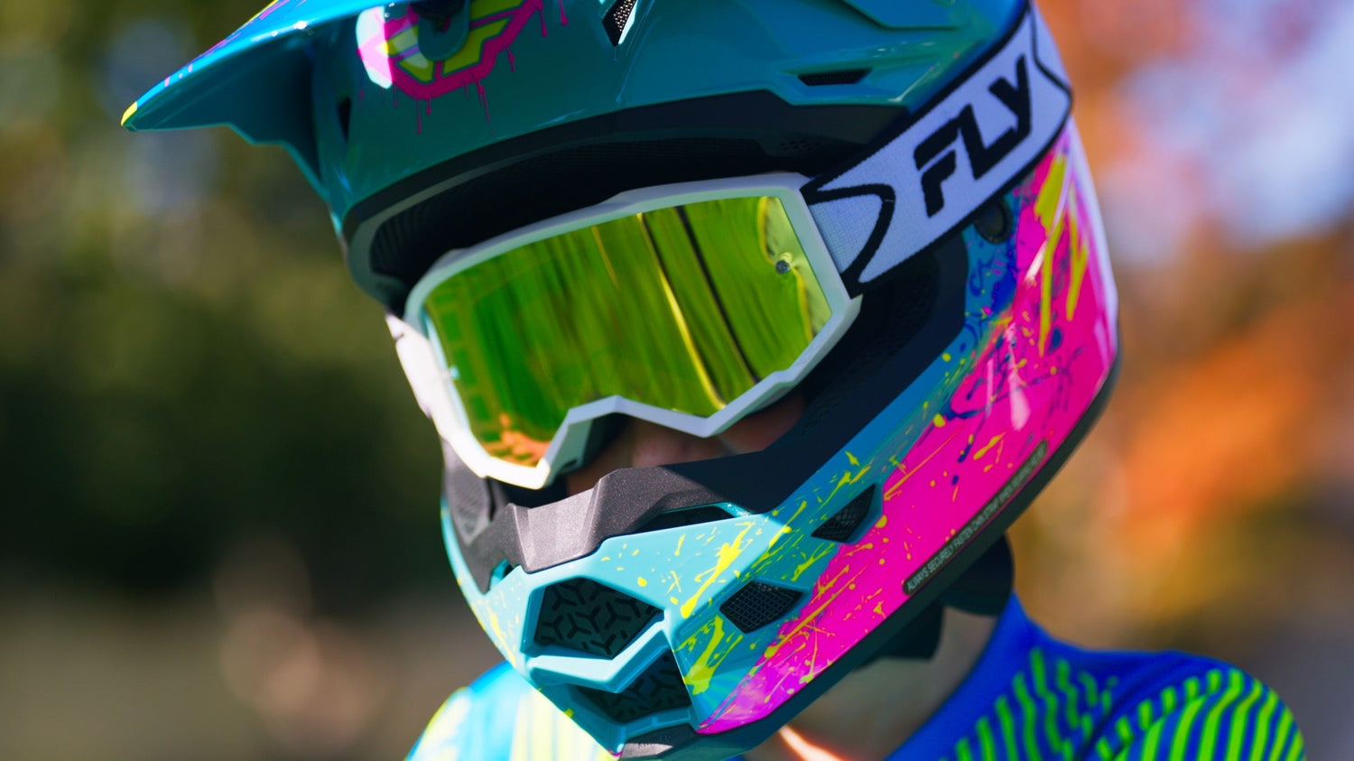 Colorful TLD full-face helmet and goggles close-up for eMoto helmet guide